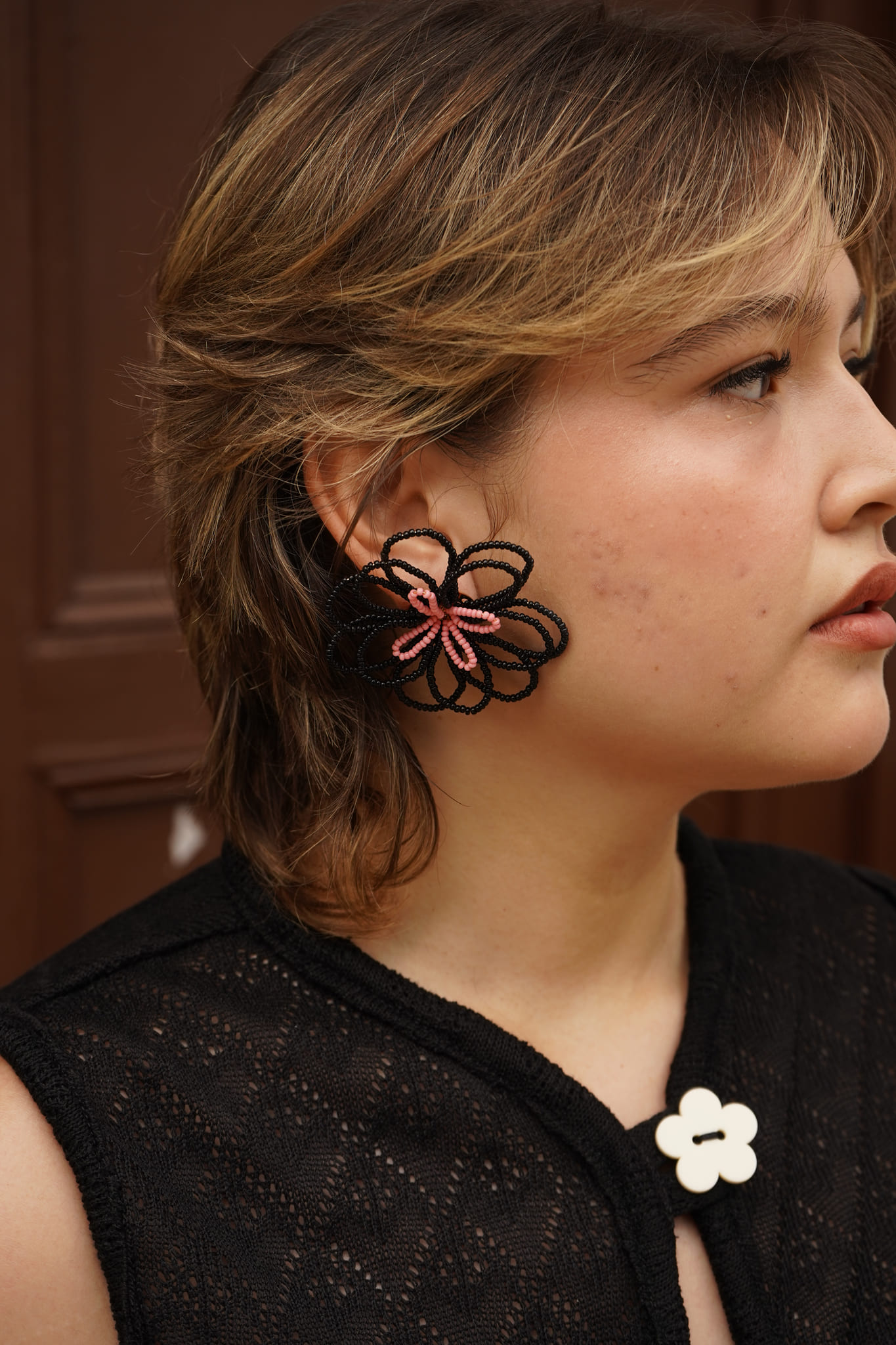 Aretes florecita tejido - negro
